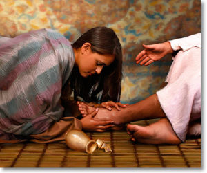 woman anointing Jesus feet